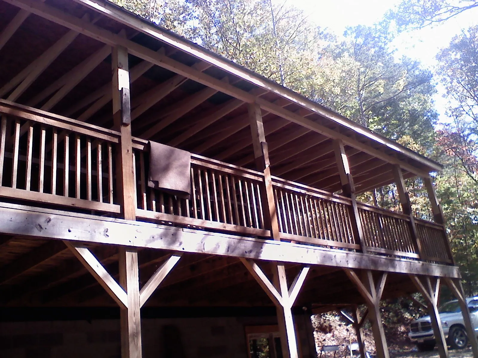 Timber framing under a new elevated porch and deck — Roof Leak Repair in Lostant by Roofing Brothers